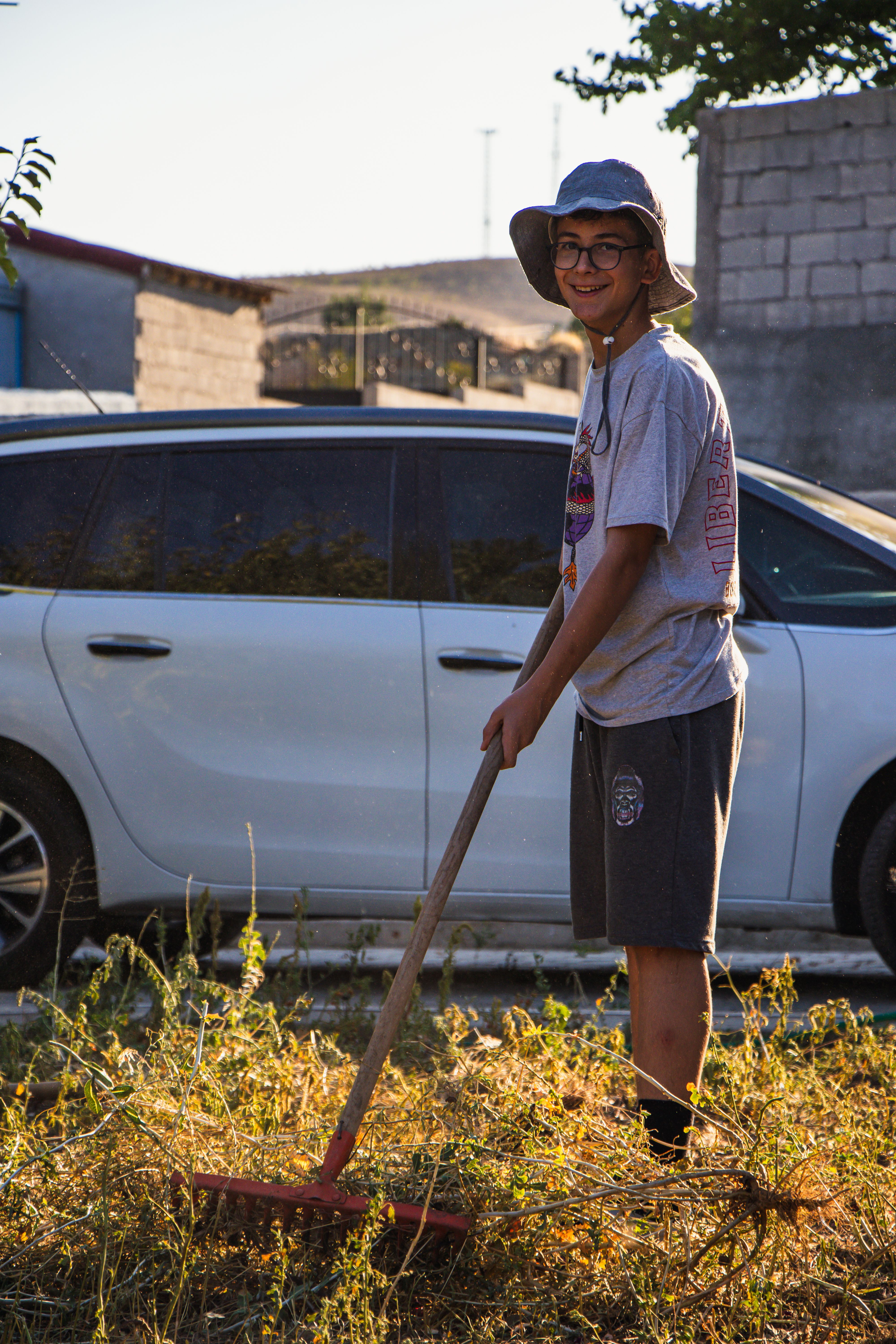 A homeowner paying a teenager after a chore well done